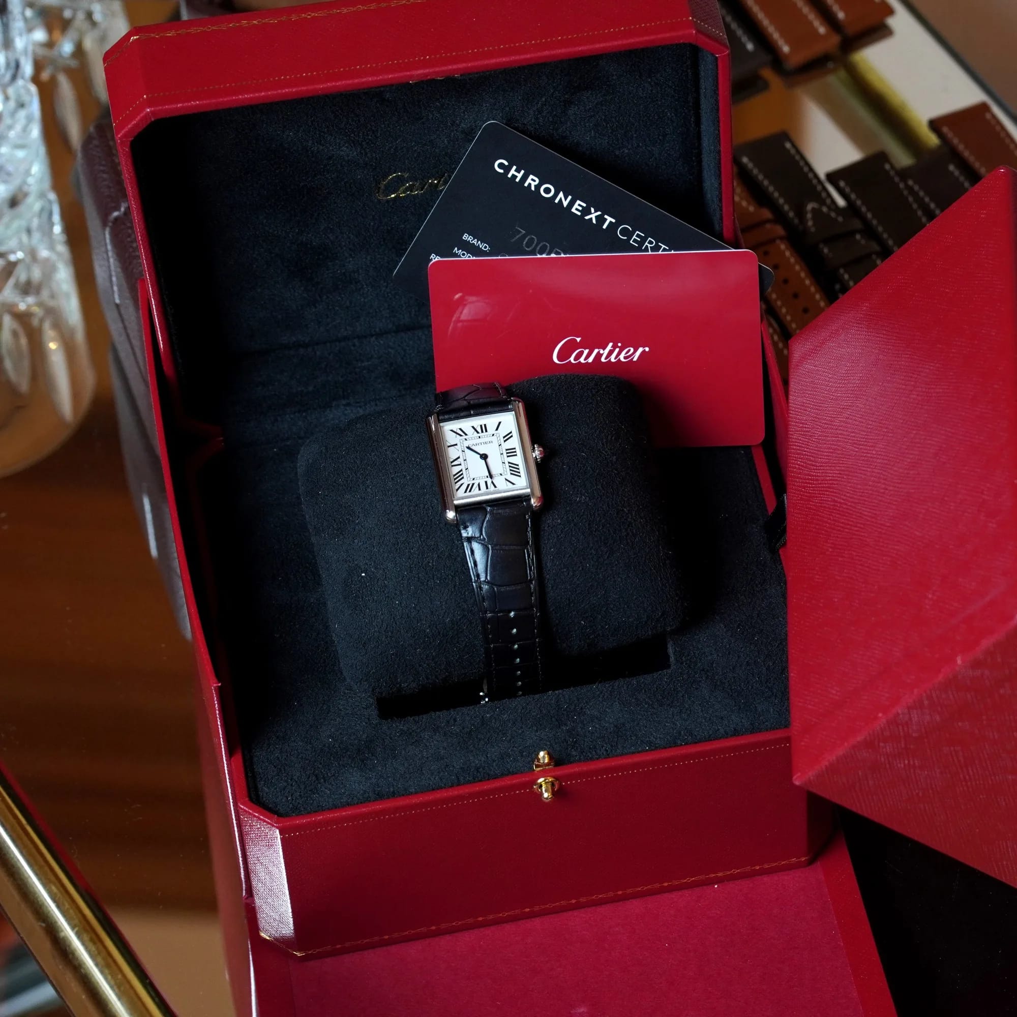 Cartier Tank Must in the red Cartier box with papers and a Chronext certificate card
